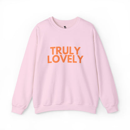 Pink sweatshirt with 'TRULY LOVELY' text in orange on a white background