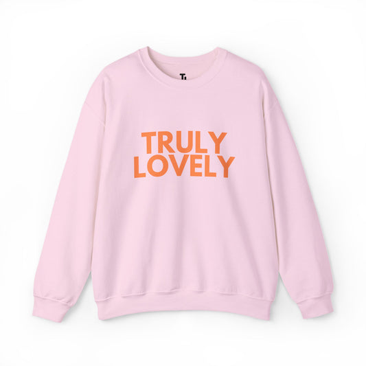 Pink sweatshirt with 'TRULY LOVELY' text in orange on a white background